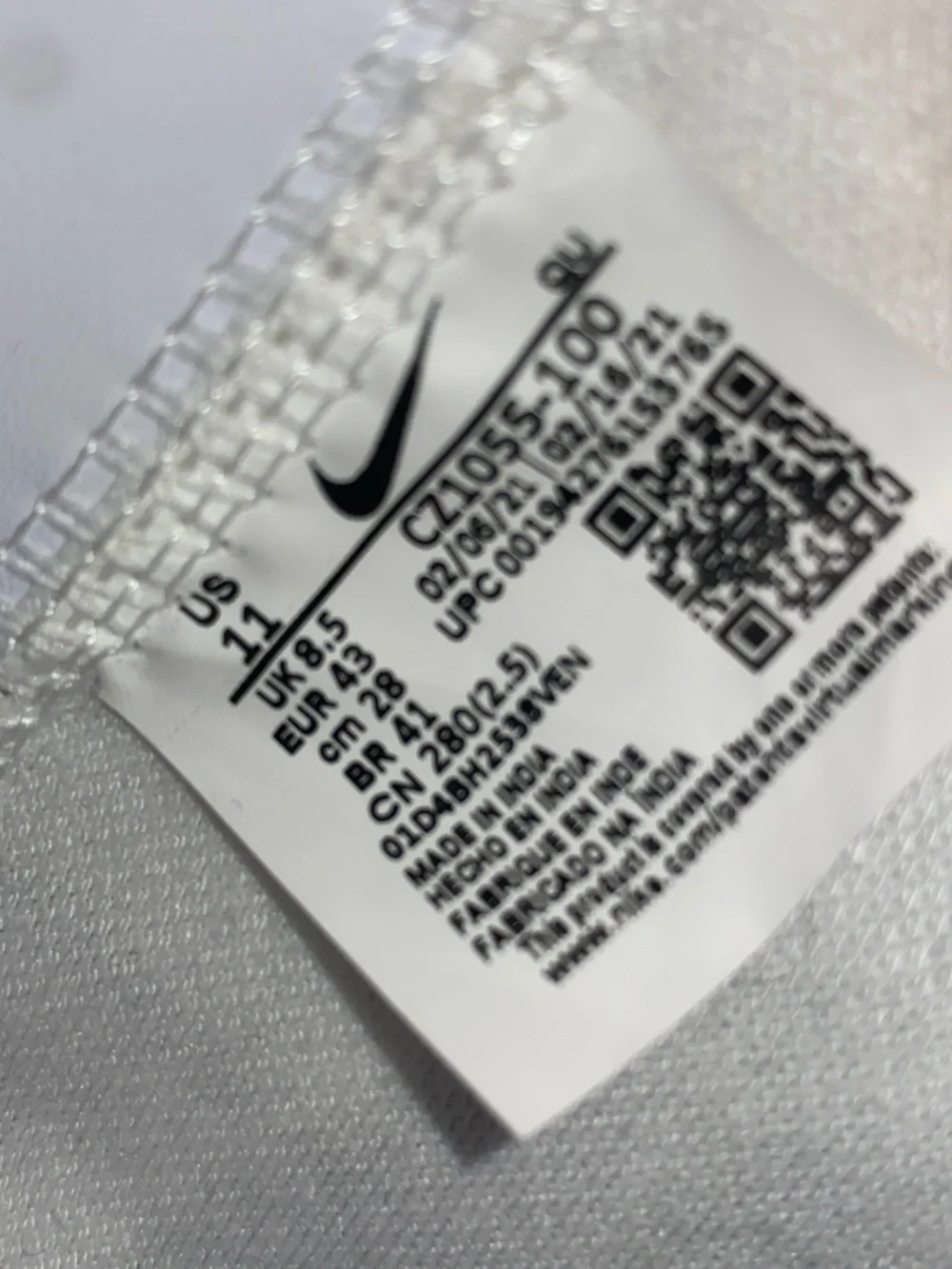 Nike White and Black High-Top Sneakers